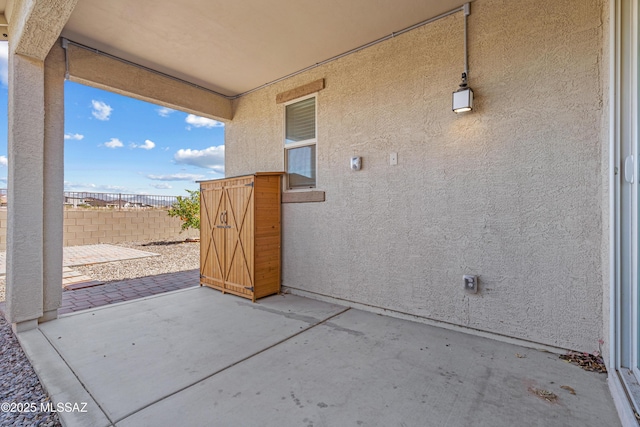 view of patio / terrace with fence