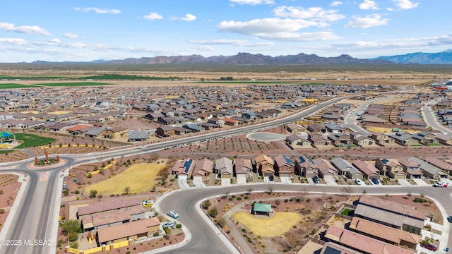 bird's eye view with a residential view and a mountain view