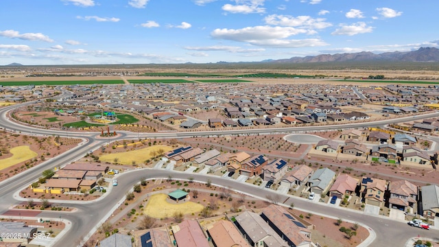 drone / aerial view featuring a mountain view and a residential view