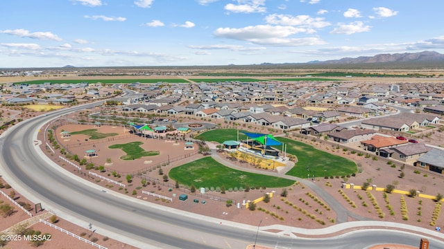 birds eye view of property with a residential view and a mountain view