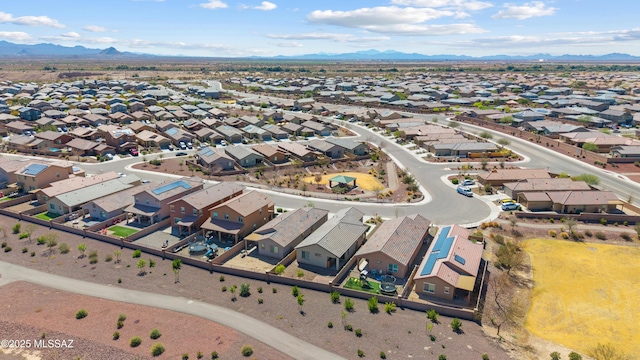 bird's eye view with a residential view and a mountain view