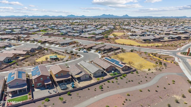 drone / aerial view with a residential view and a mountain view