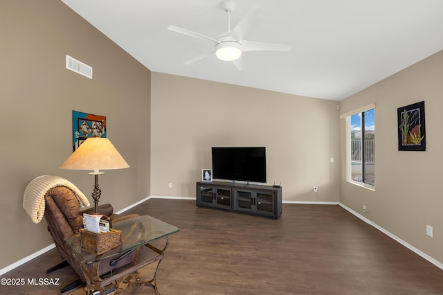 63606 E Desert Peak Dr, Tucson, AZ 85739 - living room featuring visible vents, baseboards, dark wood-type flooring, and ceiling fan