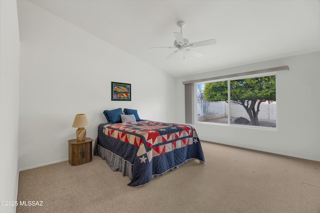 63606 E Desert Peak Dr, Tucson, AZ 85739 - carpeted bedroom with vaulted ceiling, a ceiling fan, and baseboards