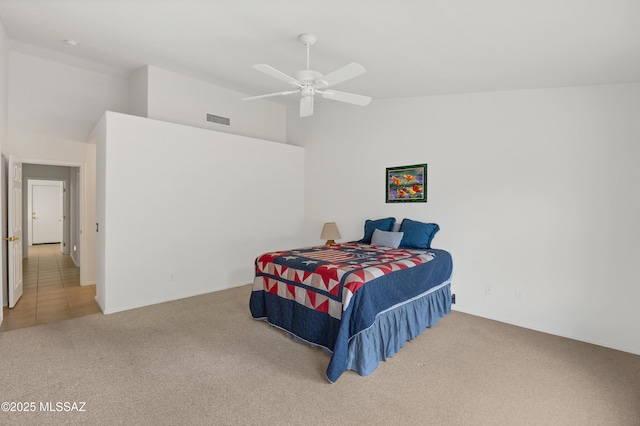 63606 E Desert Peak Dr, Tucson, AZ 85739 - bedroom featuring visible vents, high vaulted ceiling, a ceiling fan, and carpet floors