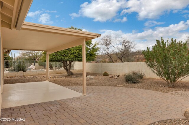 63606 E Desert Peak Dr, Tucson, AZ 85739 - view of patio / terrace featuring a fenced backyard