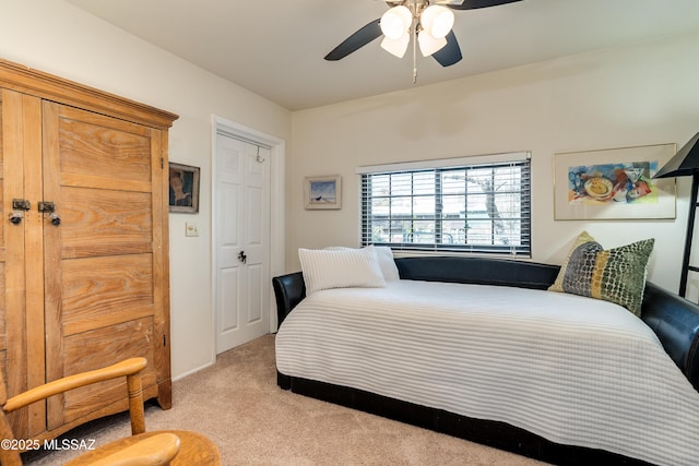 bedroom with carpet flooring and ceiling fan