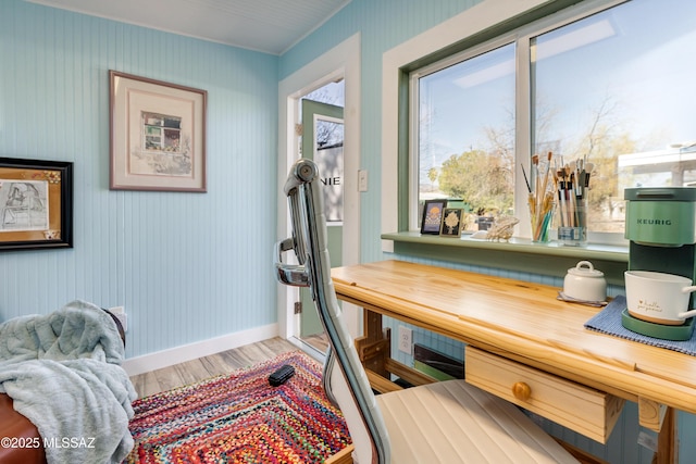 office featuring light wood-type flooring and baseboards