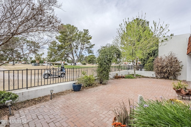 view of patio with fence