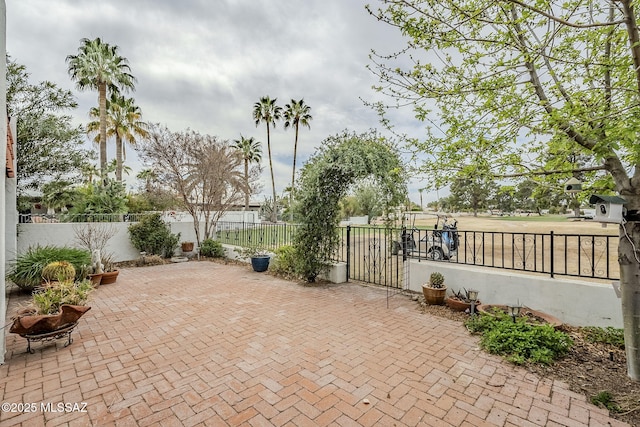 view of patio / terrace with fence private yard and a gate