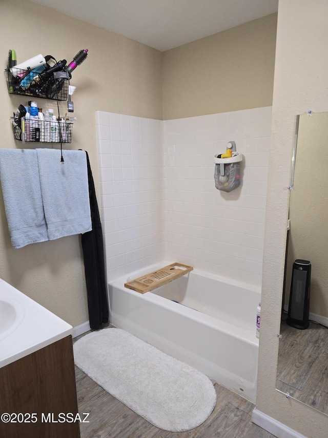 full bathroom featuring wood finished floors