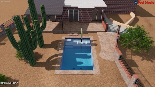 view of pool featuring a patio and fence