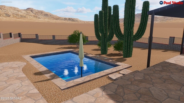 view of swimming pool featuring a patio area, fence, and a mountain view