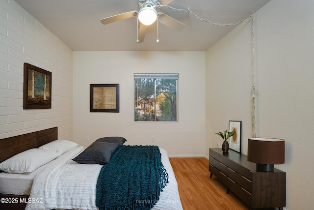 418 N Calle De Las Profetas, Green Valley, AZ 85614 - bedroom with light wood finished floors and a ceiling fan