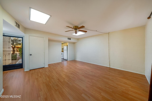 418 N Calle De Las Profetas, Green Valley, AZ 85614 - spare room featuring a ceiling fan, light wood-style flooring, and baseboards