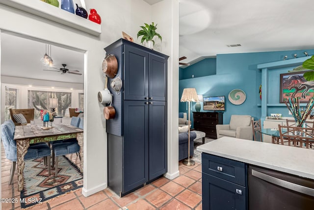 kitchen featuring visible vents, a ceiling fan, open floor plan, light countertops, and stainless steel dishwasher