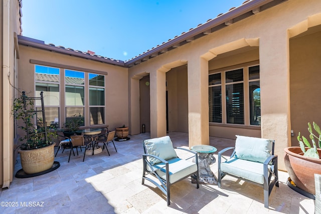 view of patio with outdoor dining space