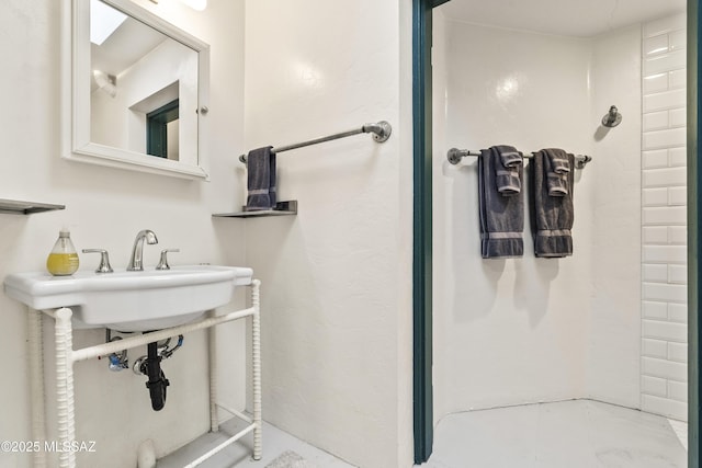 bathroom featuring a shower