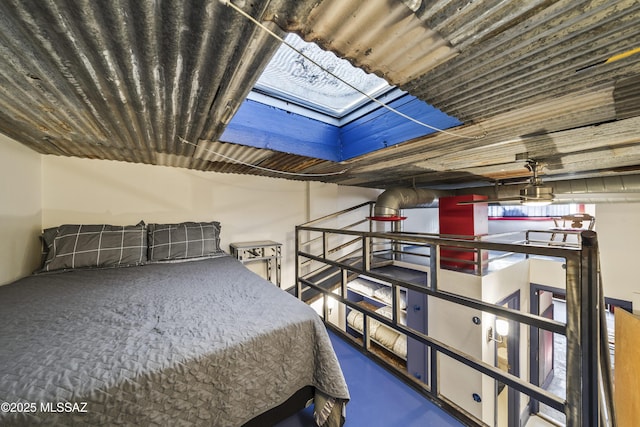 bedroom with finished concrete flooring