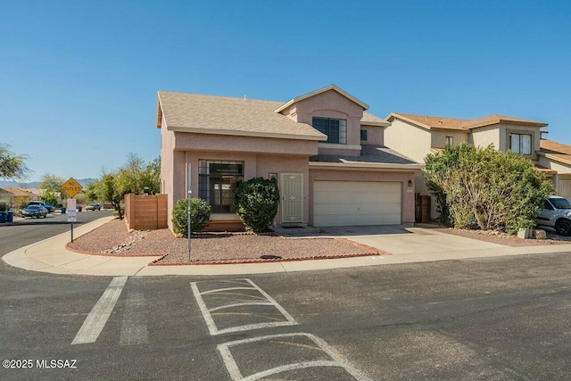 view of property featuring stucco siding, concrete driveway, a garage, and a shingled roof