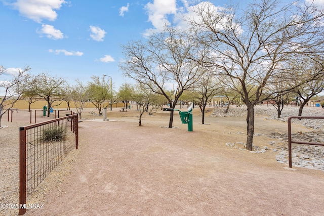 view of property's community with fence