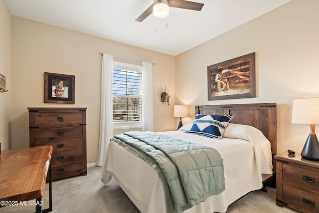 bedroom with baseboards, light carpet, and a ceiling fan