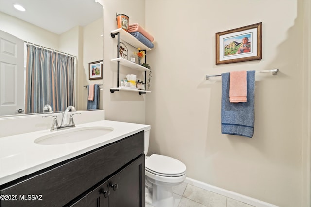 bathroom featuring a shower with curtain, toilet, tile patterned flooring, baseboards, and vanity