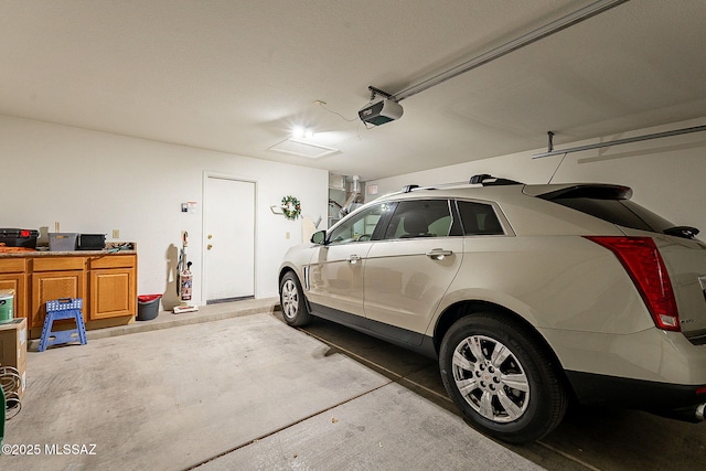 garage featuring a garage door opener