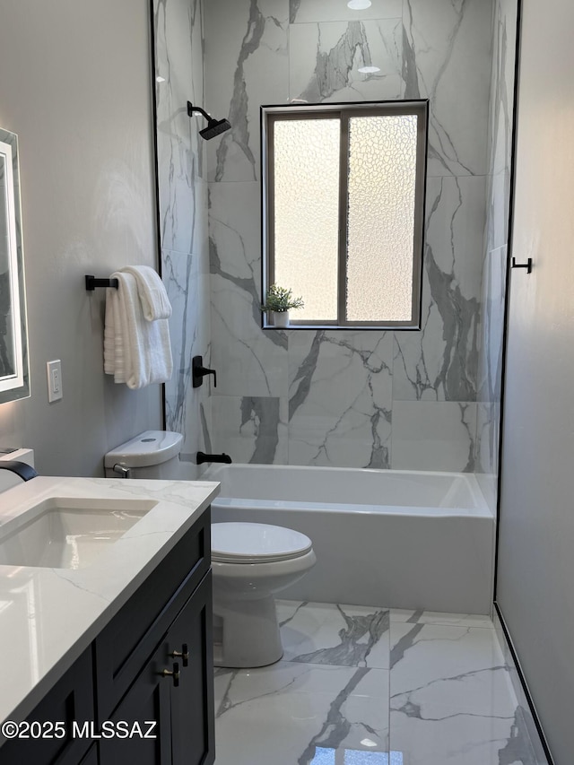 bathroom with vanity, shower / bathing tub combination, toilet, and marble finish floor