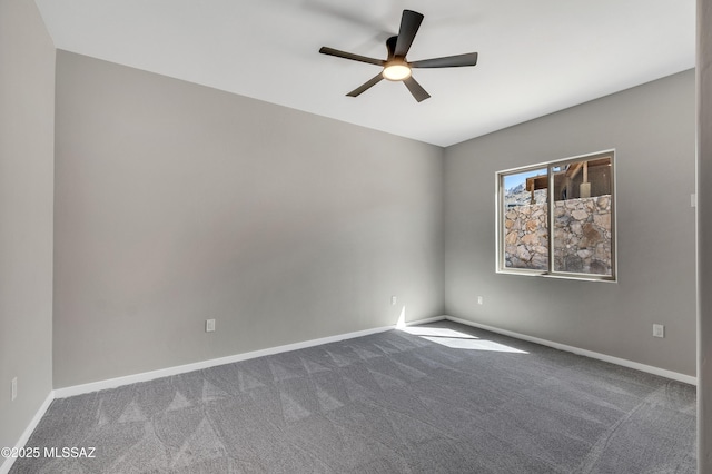 unfurnished room with carpet floors, ceiling fan, and baseboards