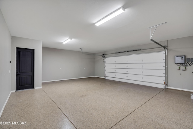 garage with baseboards