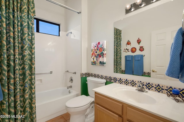 full bath with toilet, shower / tub combo, vanity, and tile patterned floors