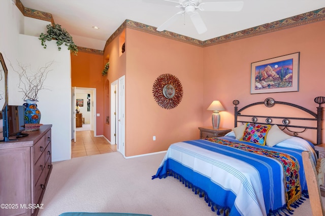 bedroom featuring carpet floors, baseboards, and a ceiling fan