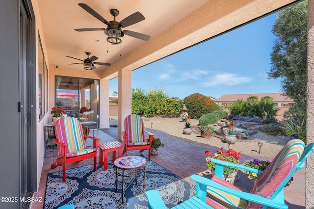 view of patio featuring a ceiling fan