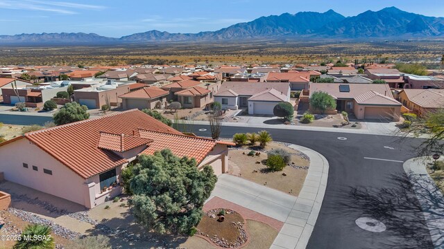 aerial view featuring a residential view and a mountain view