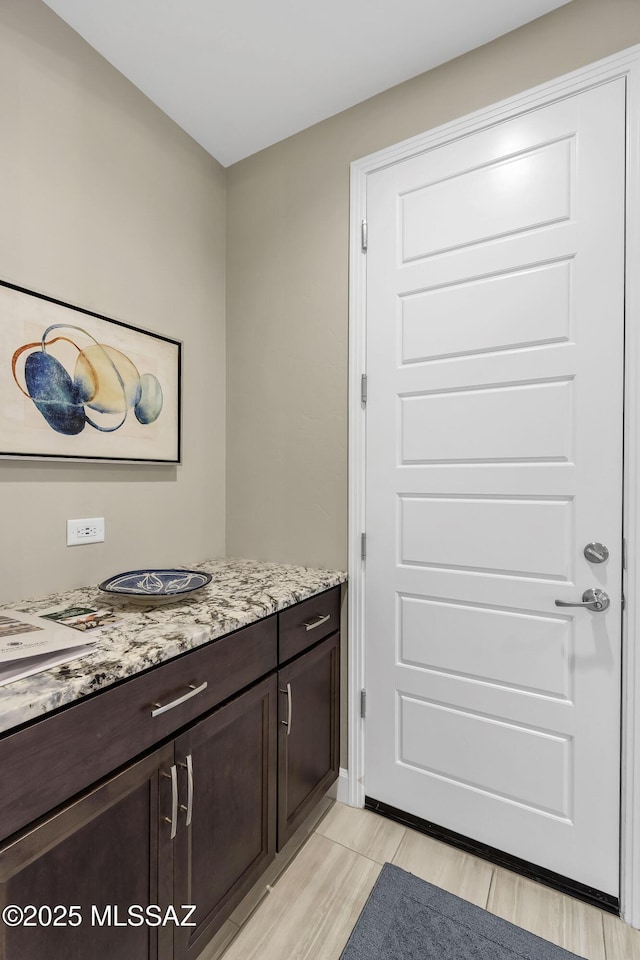 bathroom featuring vanity and wood finished floors