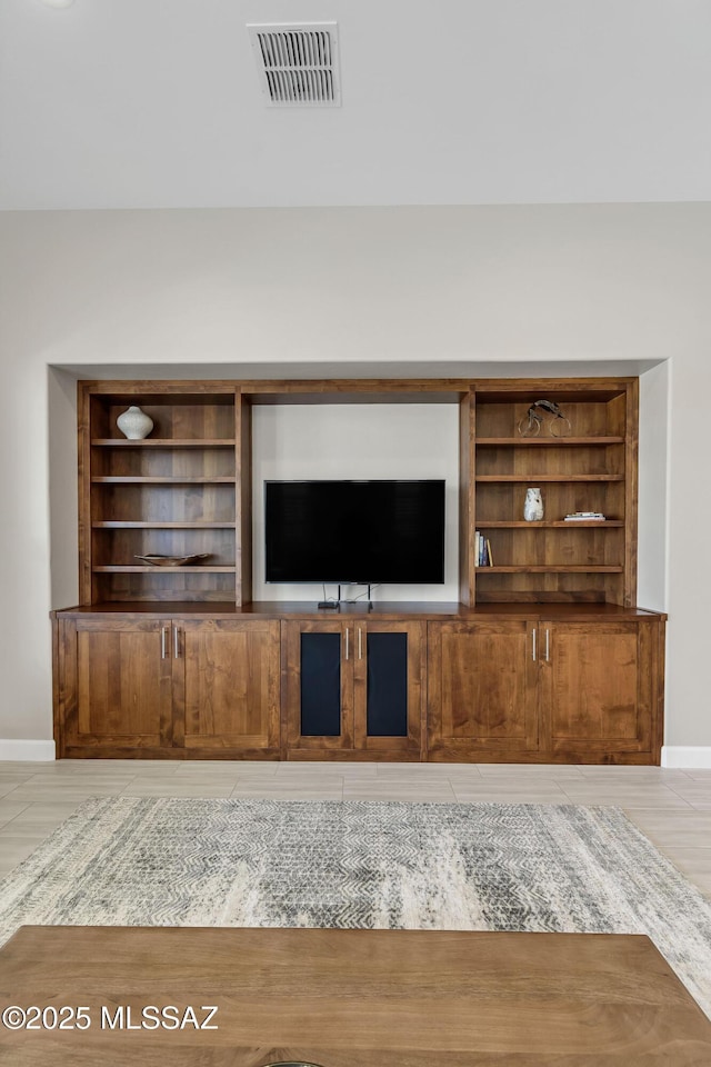 room details with visible vents and baseboards