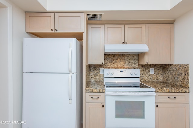 kitchen with under cabinet range hood, visible vents, white appliances, and tasteful backsplash