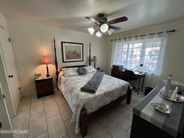 bedroom featuring light tile patterned floors and a ceiling fan