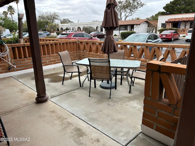 view of patio featuring outdoor dining space