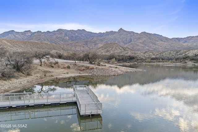 dock area with a water and mountain view