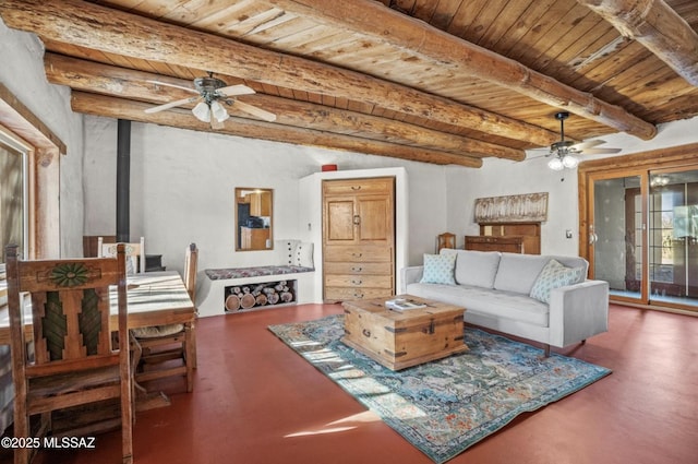 living room with a ceiling fan, wood ceiling, finished concrete flooring, and beam ceiling