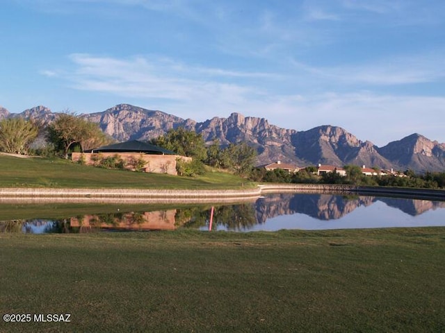 view of mountain feature featuring a water view