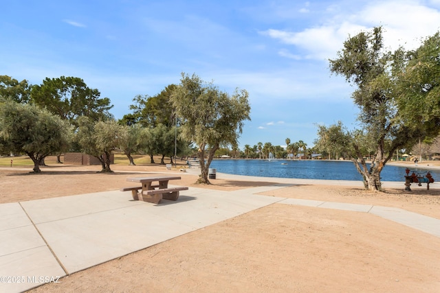 view of home's community with a water view