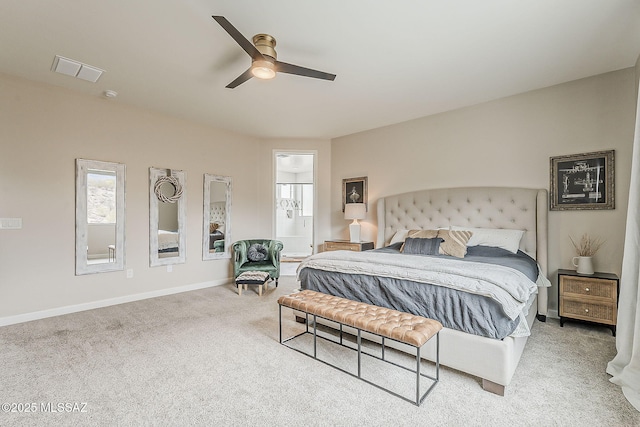 bedroom featuring multiple windows, carpet flooring, visible vents, and baseboards