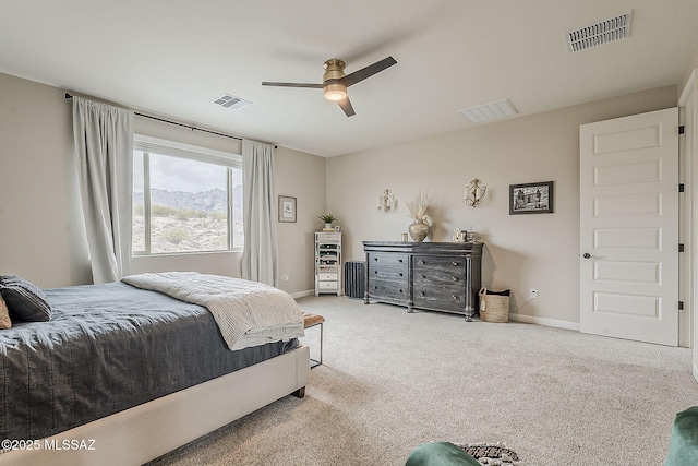 bedroom featuring carpet, visible vents, and baseboards