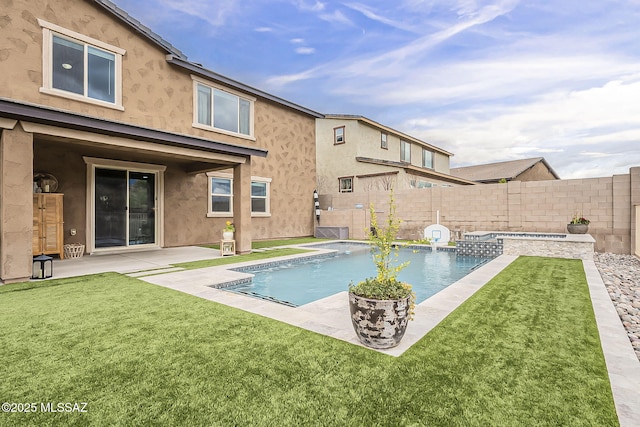 view of pool with a fenced in pool, a patio area, a fenced backyard, and a yard