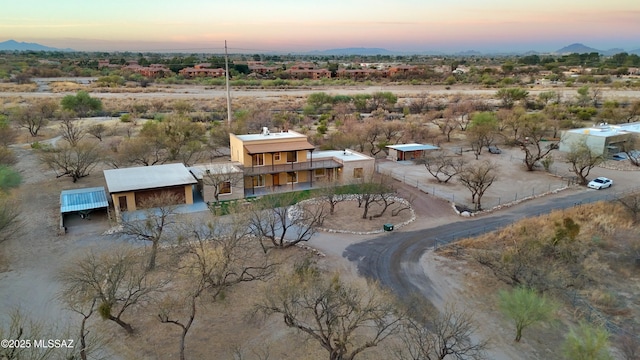 aerial view at dusk with a mountain view