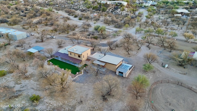 birds eye view of property featuring view of desert