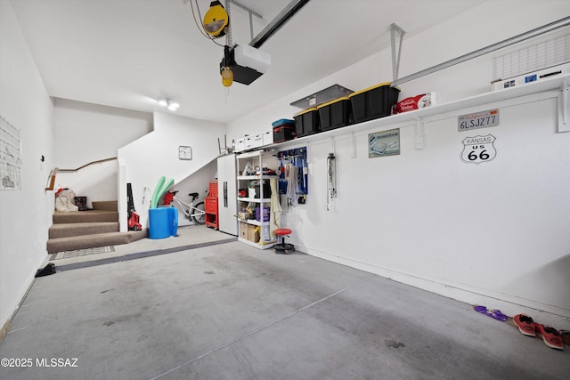 garage featuring a garage door opener